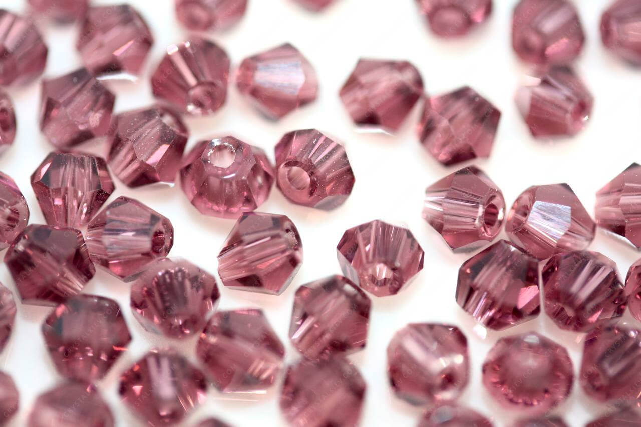 Намистина Біконус Lt. Amethyst